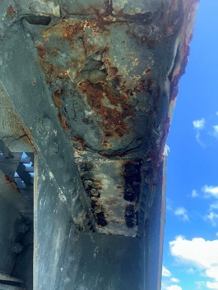 alt="Active corrosion on structural components of Blackburn Point Bridge"